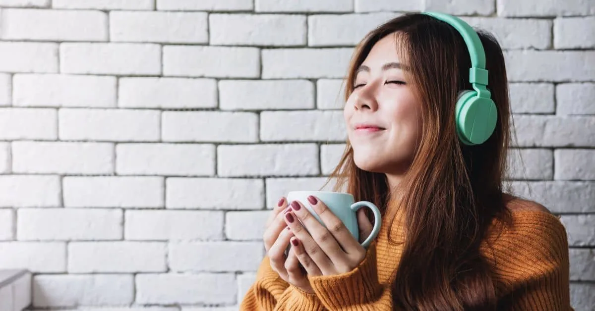 Enjoying a delicious cup of coffee.
