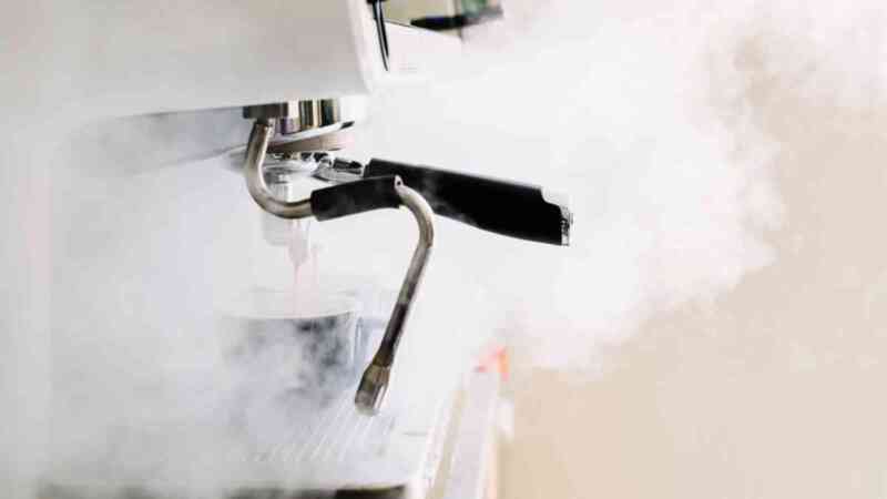 Make sure that you let out some steam to clear the steam wand of milk residue.