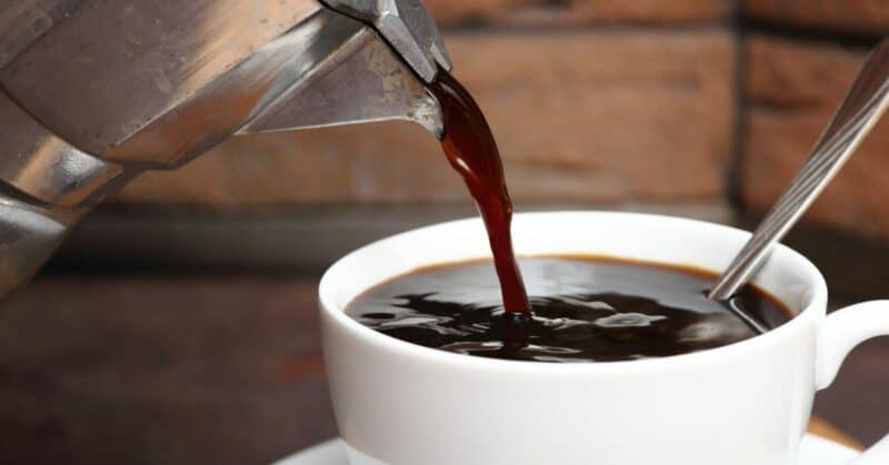 Pouring a delicious cup of Moka coffee